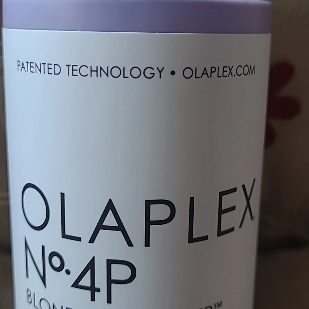 Olaplex No.4P Blonde Enhancer Toning Shampoo.